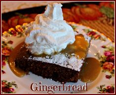 there is a piece of cake with whipped cream on it and the words gingerbread above it