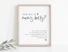 a white framed poster with the words how big is mother's belly? on it