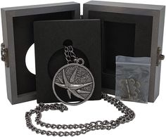 Yennefer's medallion necklace is ideal for any fan of the sorceress from Vengerberg. The intricate details and high quality have been inspected and approved by the best craftsmen in Aedirn. Molded flat relief design; medallion constructed from zinc alloy Yennefer's medallion necklace is ideal for any fan of the sorceress from Vengerberg. The intricate details and high quality have been inspected and approved by the best craftsmen in Aedirn. Molded flat relief design; medallion constructed from zinc alloy, chain is iron. Medallion measures approximately 2 inches in diameter; chain is 30 inches. Packaged in wooden collector's case, measures 3.75 x 4.5 x 1 inches. Ages 15 and up. The Witcher Yennefer, Witcher Yennefer, The Sorceress, Relief Design, Medallion Necklace, The Witcher, Intricate Details, Zinc Alloy, The Collector