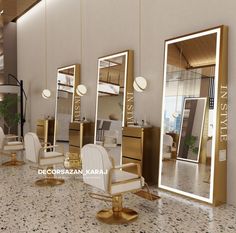 the interior of a hair salon with gold mirrors and white chairs in front of them