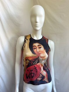 Vintage red tank top from Moschino Jeans. Geisha print on front and sequin trim details. Size I42 USA8 D38 tag, fits XS-S (see measurements ) Condition 9/10 (small hole) Made in Italy Underarm to underarm -  cm/"  Length from the back - cm/"  📍 follow the shop on Instagram: @𝚔𝚘𝚛𝚊𝚛𝚎_𝚟𝚒𝚗𝚝𝚊𝚐𝚎 All measurements taken with garment lying flat.  Vintage sizes vary greatly! We recommend comparing measurements with a similar style garment you own for best fit! If you have any other questions Y2k Graphic Print Racerback Top, Y2k Racerback Top With Graphic Print, Y2k Sleeveless Printed Tops, Y2k Style Red Tank Tops, Fitted Graphic Print Camisole Top, Fitted Sleeveless Tops With Graphic Print, Red Graphic Print Tank Top For Summer, Red Cotton Y2k Tank Top, Red Fitted Y2k Tank Top