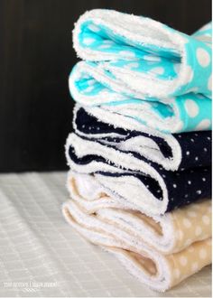 several folded towels stacked on top of each other