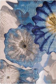 an abstract painting with blue flowers on it