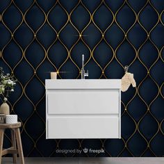 a white sink sitting on top of a wooden table next to a wall mounted faucet