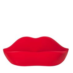 a red lip shaped object on a white background