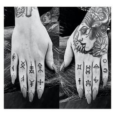 two hands with tattoos and symbols on them