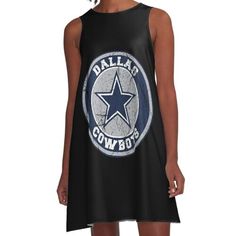 a women's black dress with the word, dallas cowboys in blue and white