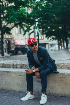 Inspired by the recent NFL Draft, I decided to step out in a casual quasi-suit getup with a sporty edge. I've become quite enamored with Ebbets Field Flannels vintage baseball caps, and this one might just be my favorite. Its bright red color and bold block 'B' contrasts the rest of this ou Baseball Cap Mens Style, Ebbets Field Hat Outfit, Red Cap Outfit Men, Men In Baseball Caps, Red Hat Outfit Men, Casual Red Fitted Hat, Red Snapback Hat For Streetwear And Baseball Season, Baseball Hat Outfit Men, Red Retro Fitted Hat For Baseball Season