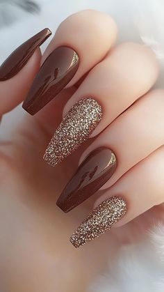 Trending Nails Right Now, Acrylic Nails Fall 2024, Fall Acrylic Nails 2024, Brown Nails With Accent Nail, Nails That Go With Every Outfit, Brown Nails With Gold Glitter, Brown Glitter Nails Fall, Fall Brown Nails Design, Dark Brown Nails Acrylic