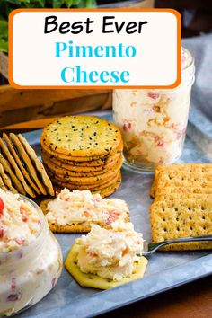 a platter with crackers, cheese and crackers next to it is the title text reads best ever pinento cheese