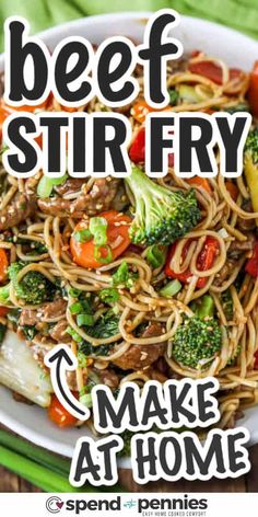 beef stir fry with broccoli, carrots and noodles in a white bowl