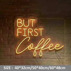 a neon sign that says but first coffee on the side of a brick wall,