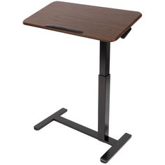 a wooden desk with a black metal base