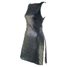 F/W 1999 Gianni Versace by Donatella Matte Sequin Tunic Dress Teal Lining | From a unique collection of rare vintage Cocktail Dresses at https://www.1stdibs.com/fashion/clothing/day-dresses/cocktail-dresses/. Luxury Cocktail Sequin Dress, Luxury Sequin Dress For Cocktail Occasions, Fitted Metallic Sequin Dress With Contrast Sequins, Metallic Embellished Fitted Sequin Dress, Metallic Sequin Evening Dress, Luxury Silk Evening Dress With Sequins, Metallic Silk Cocktail Dress, Metallic Silk Dress For Evening, Fitted Shimmer Sequin Dress For Evening