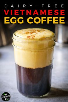 an egg coffee in a mason jar with the text dairy - free vietnamese egg coffee