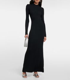 Palmira Ribbed Knit Maxi Dress in Black - Staud | Mytheresa Ribbed Maxi Dress For Work, Chic Formal Maxi Dress By Staud, Elegant Ribbed Maxi Dress For Work, Staud Fitted Maxi Dress, Evening Ribbed Long Maxi Dress, Chic Evening Ribbed Maxi Dress, Chic Evening Maxi Dress With Ribbed Details, Winter Ribbed Maxi Dress, Long Sleeve Ribbed Evening Maxi Dress