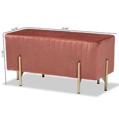 a pink bench with gold legs and measurements