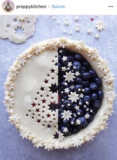 two pies decorated with stars and blueberries