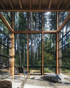 the inside of a house with large windows