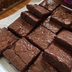 chocolate brownies are stacked on top of each other