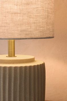 a lamp that is on top of a table