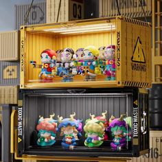 the nintendo figurines are sitting on top of each other in a storage container