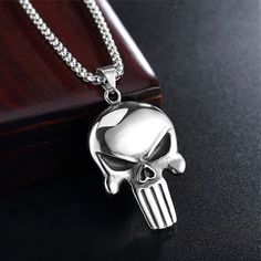 PLEASE READ THIS DESCRIPTION CAREFULLY! First of all, you are warmly welcomed to my newly started Etsy shop! This High-quality gothic punisher skull pendant necklace is made in stainless steel. The pendant has 52mm in height 35mm in width & 36g in weight. This has a better metal structure. Therefore do not fade. It is 100% handmade and of exquisite quality. This classic necklace can be delivered to some countries like the UK within 7-14 DAYS. These days this necklace is available at a SPACIAL DI Skull Print Metal Jewelry For Streetwear, Halloween Skull Print Jewelry For Streetwear, Halloween Skull Print Jewelry, Punk Skull Stainless Steel Necklace, Punk Skull Shaped Stainless Steel Necklace, Punk Skull Necklace In Stainless Steel, Marvel Jewelry, Mens Chain, Mens Necklace Pendant