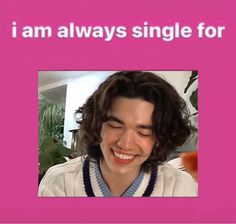 a young man smiling and wearing a necklace with the words i am always single for you