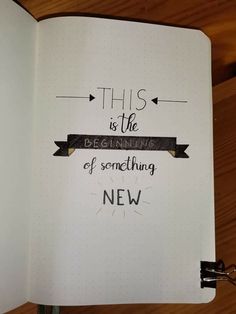 an open notebook with the words, this is the beginning of something new