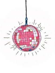 an ornament hanging from a string on a white background