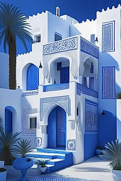 a blue and white building with palm trees in the background