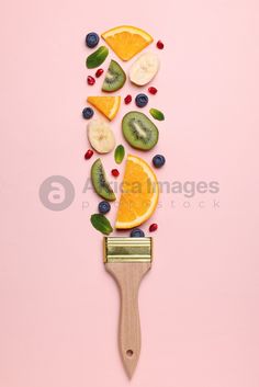 fruits are arranged on top of a brush