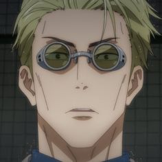 an anime character with green eyes and glasses looking at the camera while standing in front of a tiled wall