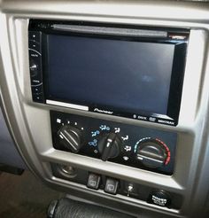 the dashboard of a car with an electronic display