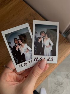 two polaroids in the palm of someone's hand, one is holding a wedding photo