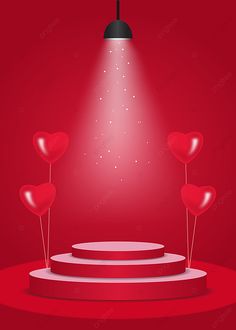 a red stage with heart shaped balloons on it and a spotlight over the top that illuminates hearts