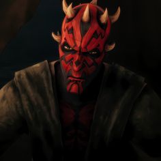 a red demon with horns on his head