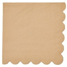 a piece of paper with scalloped edges on a white background, top view