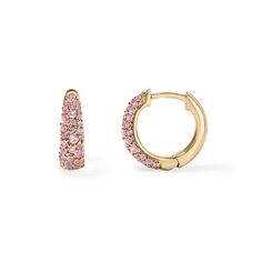 A classic twist on the pave huggie earring for a timeless accessory that embodies understated refinement. Crafted from gleaming gold and sparkling Pink Sapphires, these earrings feature a snug, hoop-like design that "hugs" the earlobe closely. Their simplicity and versatility make them an essential addition to any jewelry collection, effortlessly complementing both casual and formal looks. Available in 14K White, Yellow, and Rose Gold Pink Sapphire weight = 0.53 carats Inner Diameter = 9mm x 8mm Huggie Earring, Diamond Cocktail Rings, Rose Gold Pink, Tennis Necklace, Band Bracelet, Diamond Shop, Timeless Accessories, Bracelet Collection, Earrings Collection