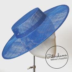 Boaters are all the rage, and this royal blue sinamay fascinator version has us all in a twirl! Made from 2 layers of stiffened sinamay, these boaters are ready to trim and have a petersham ribbon on it's inside edge. Simply add a comb or headband to secure to the head.Hat base measures:Width: 37cm (14.5 inches)Crown Width: Measures 15.5cm (6.1 inches) wide at base and 14cm (5.5 inches) at top Crown Height: 4.5cm (1.7 inches)Please note our latest batch of boaters have been made slightly bigger 1940s Shoes, Barbie Hat, Sinamay Fascinator, Victorian Hats, Sinamay Hats, Hat Base, Deep Royal Blue, Floral Hat, Large Hats