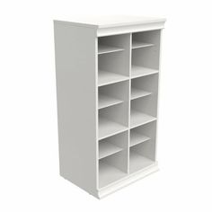 a white bookcase with many shelves on it