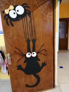 a door decorated with an image of a spider