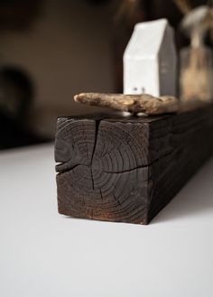 a piece of wood sitting on top of a table