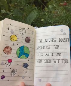 someone is holding an open notebook with drawings on it and the words, the universe doesn't aboloise for its magic and you shouldn't too