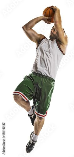 a basketball player jumping up in the air with his hands on his head and holding a ball