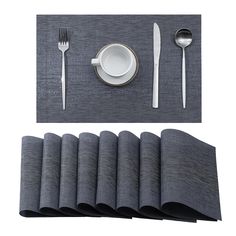 a place setting with napkins and silverware