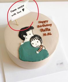 a birthday cake with an image of a man holding a child