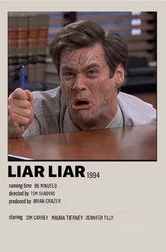 an advertisement for the movie liar with a man's face drawn on his forehead