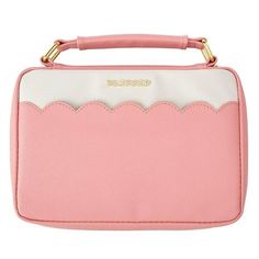 a pink and white purse with scalloped edges