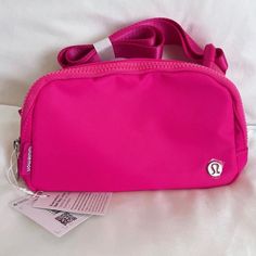 Lululemon Pink Belt Bag Must Have ! Lululemon Everywhere Belt Bag, Everywhere Belt Bag, Pink Belt, Pink Brand, Water Repellent Fabric, Fabric Bag, Black Cross Body Bag, New Year Gifts, Birthday Gifts For Her